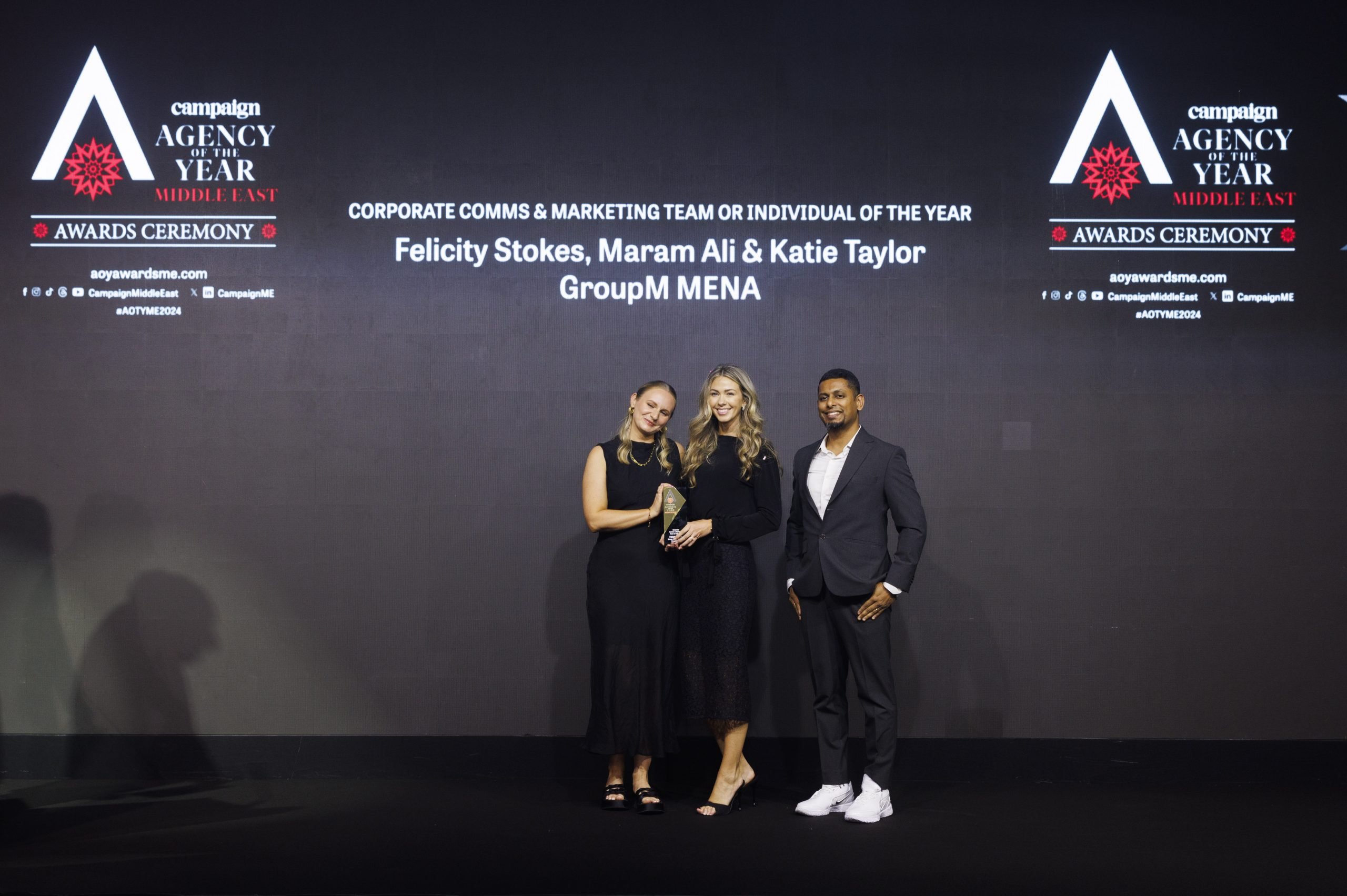 Anup Oommen, Editor of Campaign Middle East, presented the Corporate Communications & Marketing Team of the Year award to Felicity Stokes, Maram Ali, and Katie Taylor from GroupM MENA.