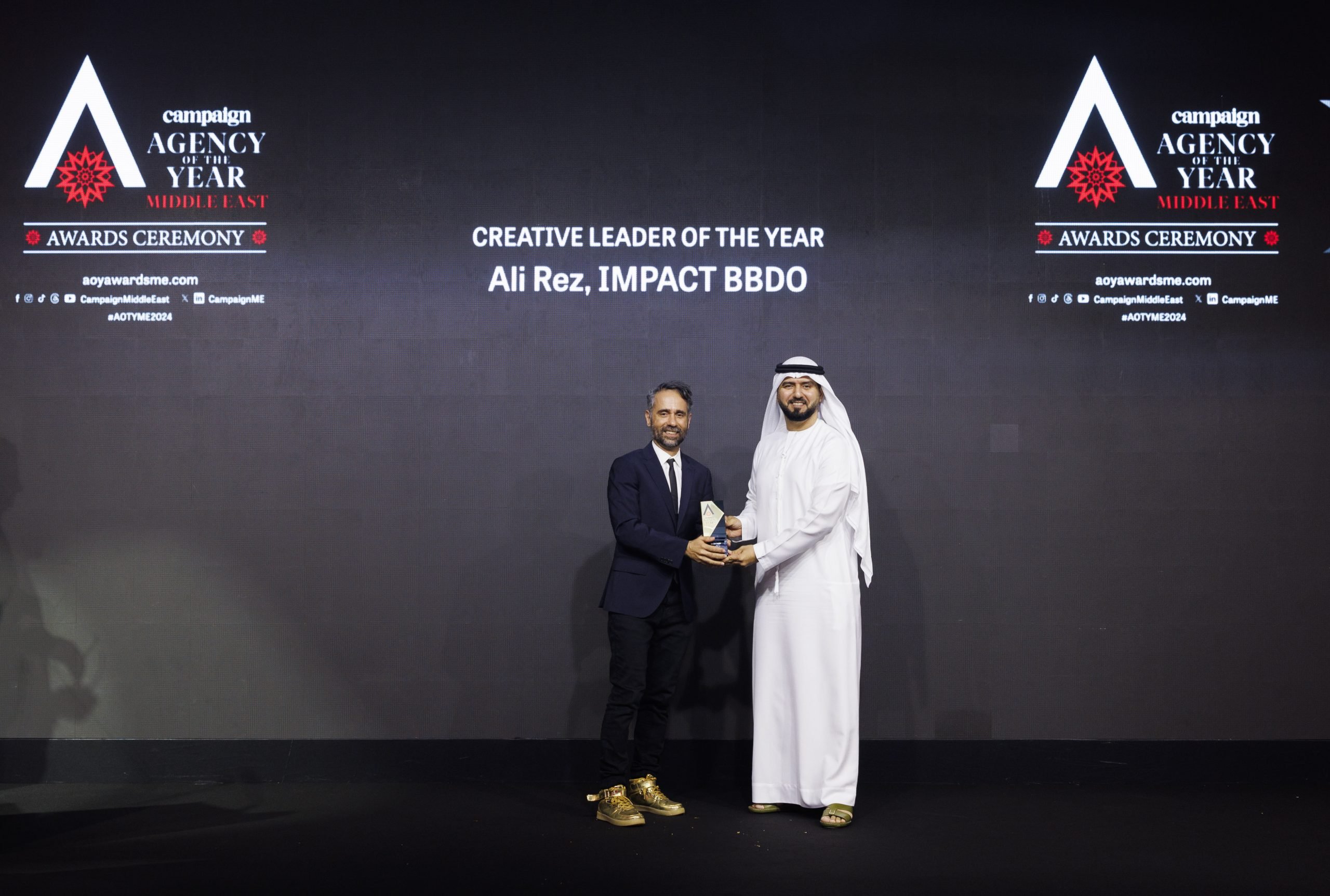 Ali Rez of Impact BBDO received the Creative Leader of the Year award from Khaled AlShehhi, Executive Director of Marketing and Communication at the UAE Government Media Office.