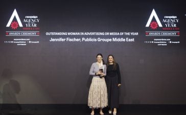 Marie-Capucine Maloy, Global Senior Director of Communications at Huda Beauty, handed over the Outstanding Woman in Advertising or Media of the Year trophy to Jennifer Fischer from Publicis Groupe Middle East.