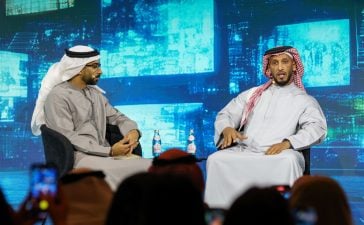 From left to right, Anas Bukhash, Entrepreneur and Interviewer, Host of #ABtalks, on stage with His Excellency Abdulla bin Mohammed bin Butti Al Hamed, Chairman of the National Media Office and Chairman of the UAE Media Council discussing the BRIDGE initiative.