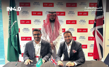 From left, seated: Abdulaziz bin Musaed AlSulaim, Chief Executive Officer of Cultural Assets Group; and Mo Isap, Chief Executive Officer of IN4 Group; sign the agreement in the presence of (standing) Abdullah Al-Zamel, Chairman of the Cultural Assets Group. Saudi