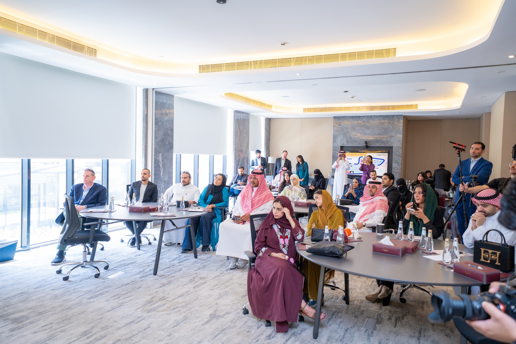 Delegates and partners attend the Athar Festival press conference in Riyadh, Saudi Arabia.