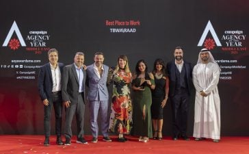 TBWA\RAAD collected the Best Place to Work in 2025 award from Khaled AlShehhi, Executive Director of Marketing and Communication, UAE Government Media Office (far right).