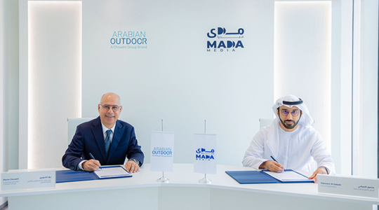 From left, Pierre Choueiri, Chairman and CEO, Choueiri Group, and Mansoor Al Sabahi, CEO, Mada Media. Arabian Outdoor