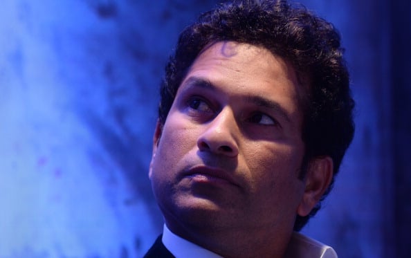 Former Indian cricketer Sachin Tendulkar looks on during a function announcing him as a UNICEF Regional Ambassador in Mumbai on November 28, 2013. Tendulkar, who recently retired from international cricket, joined the Total Sanitation Campaign as the UNICEF Regional Ambassador for programmes in Nepal, Bangladesh, Sri Lanka, India and Pakistan. AFP PHOTO/Indranil MUKHERJEE.        (Photo credit should read INDRANIL MUKHERJEE/AFP/Getty Images)