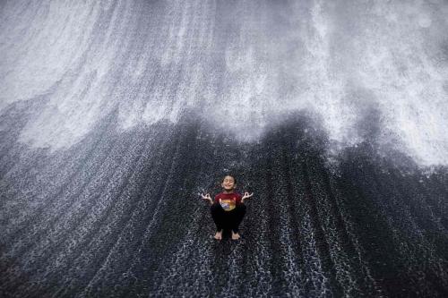 Child at EXPO water feature by Mahmoud Khaled